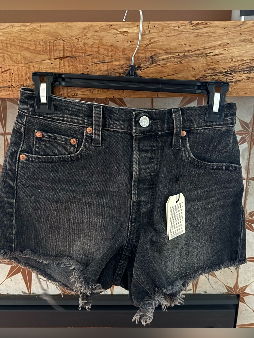 Levi’s Faded Black Frayed-Hem Denim Shorts